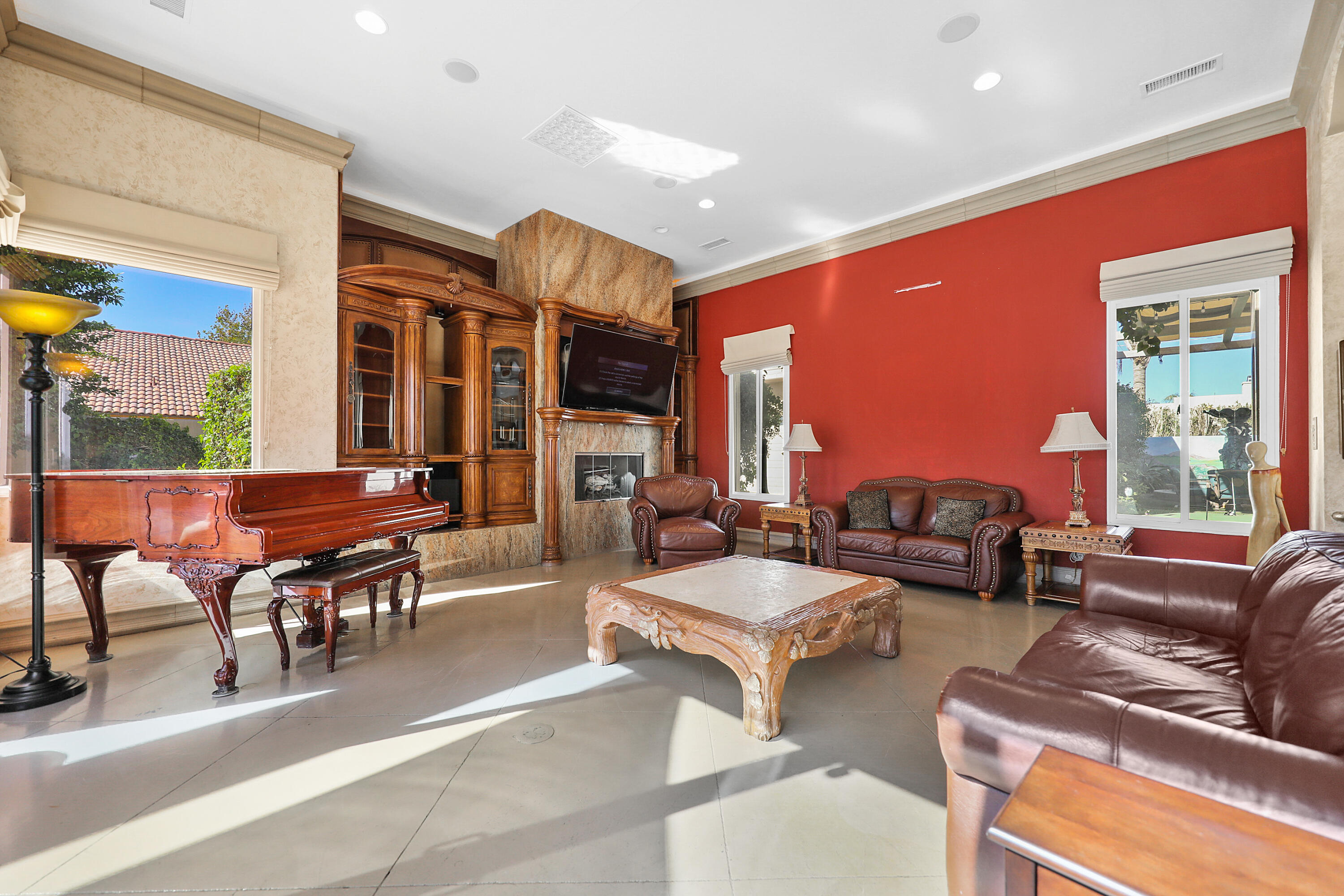 78680 Ave Tujunga La Quinta, CA 92253 - Photo 4 of 41 a living room with furniture and a large window