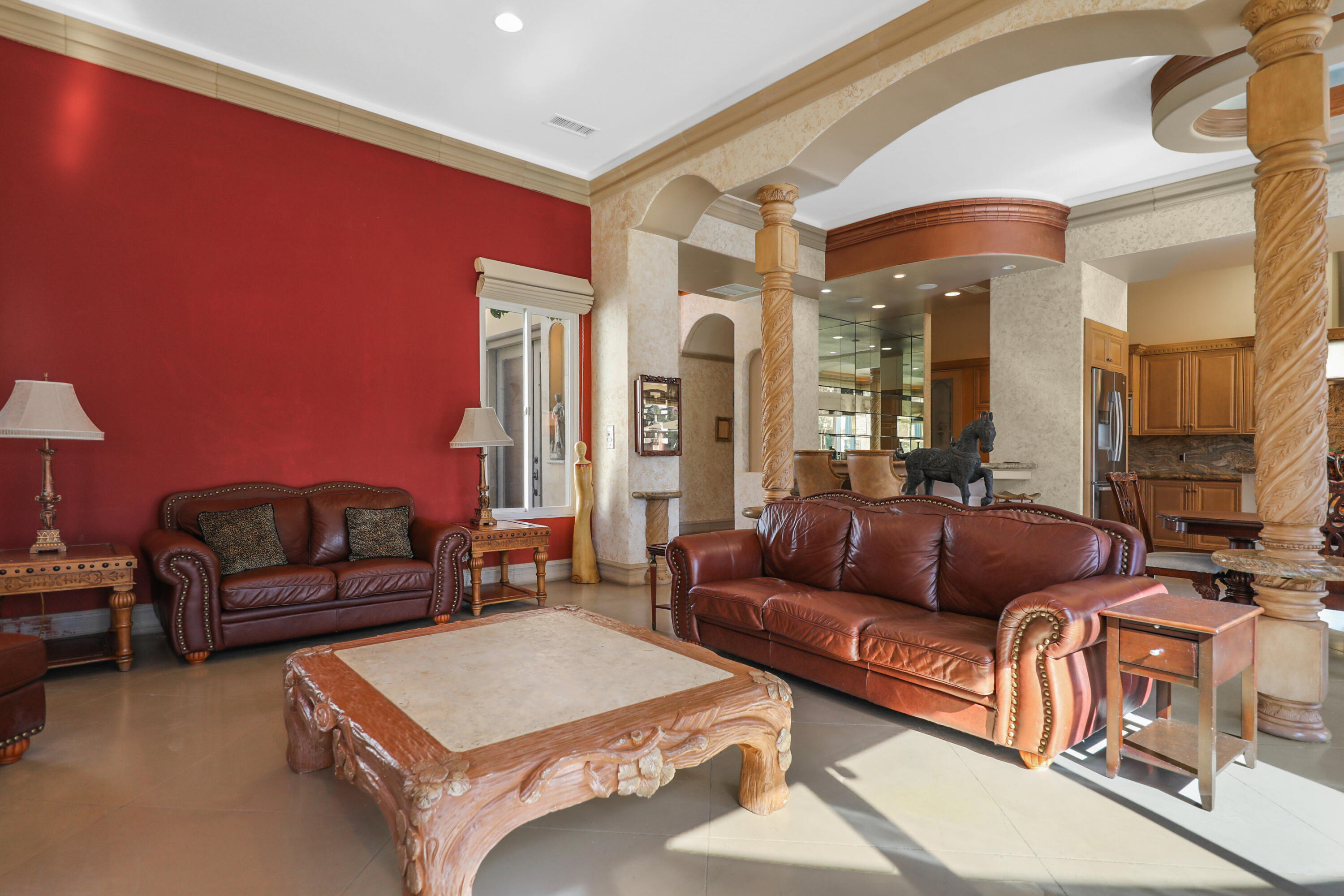 78680 Ave Tujunga La Quinta, CA 92253 - Photo 6 of 41 a living room with furniture and a couch
