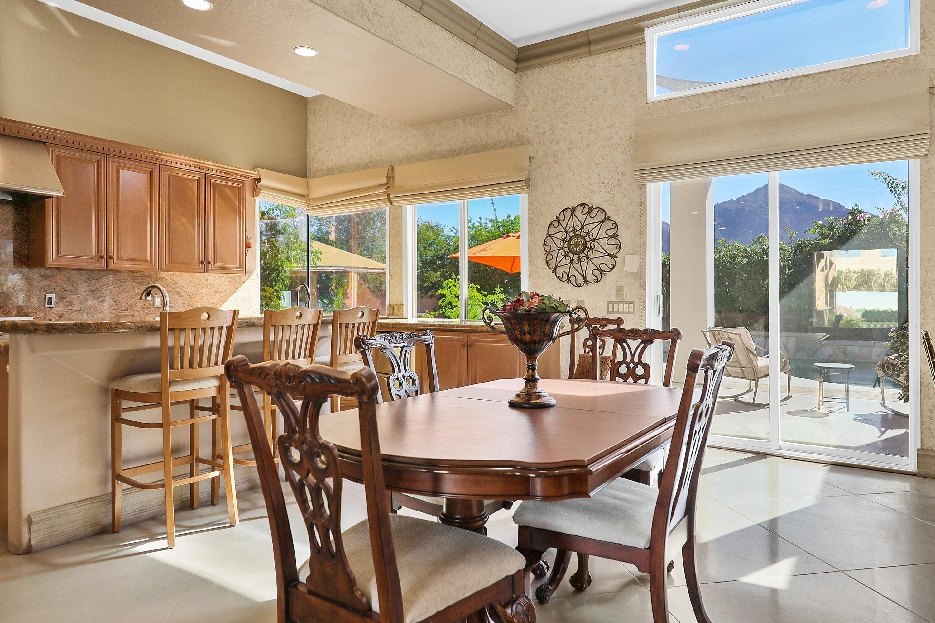 78680 Ave Tujunga La Quinta, CA 92253 - Photo 7 of 41 a view of a dining room with furniture window and outside view