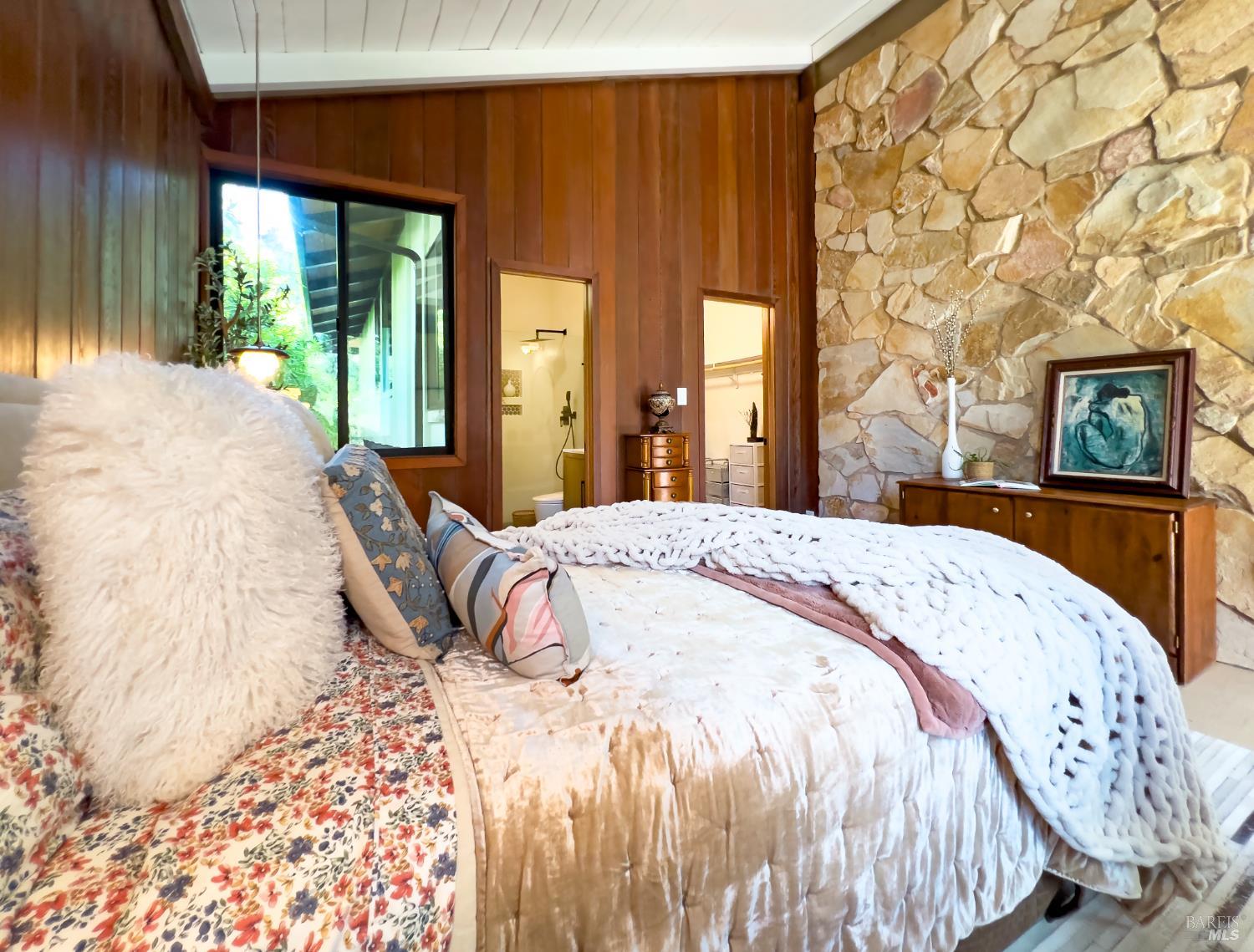 16620 Guernewood Road Guerneville, CA 95446 - Photo 22 of 68 Main bedroom on the kitchen, living room level features en suite walk-in closet and bath with glassed in tiled shower.