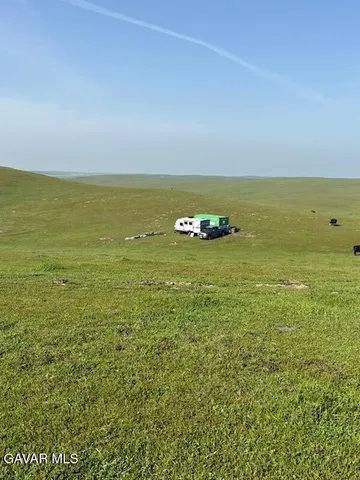 an aerial view of beach and ocean