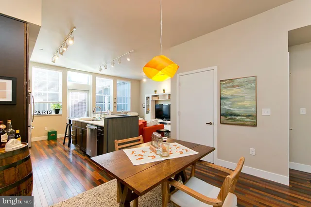 a workspace with furniture and wooden floor