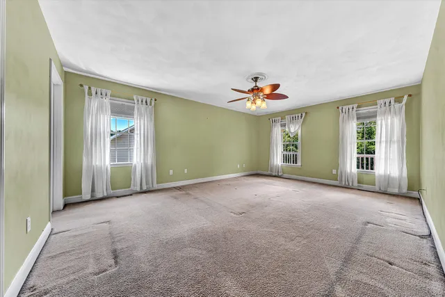 a view of balcony with wooden floor