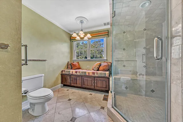 a living room with furniture a rug and a fireplace