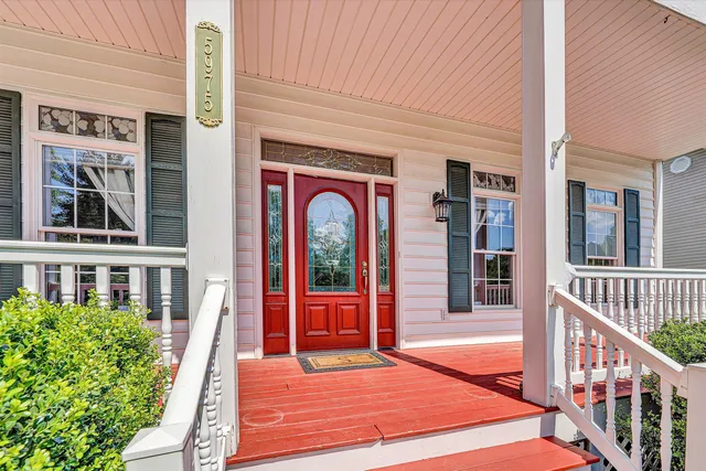 a view of entryway with wooden floor