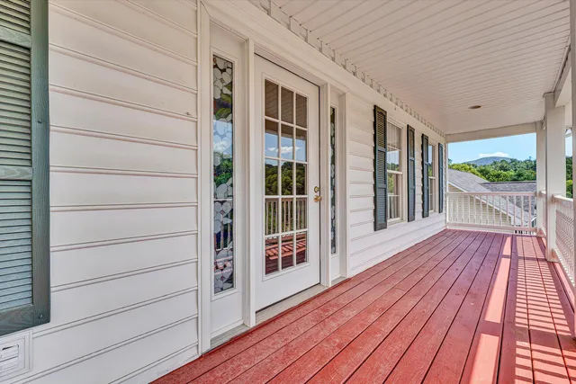 a view of a hallway with a large window