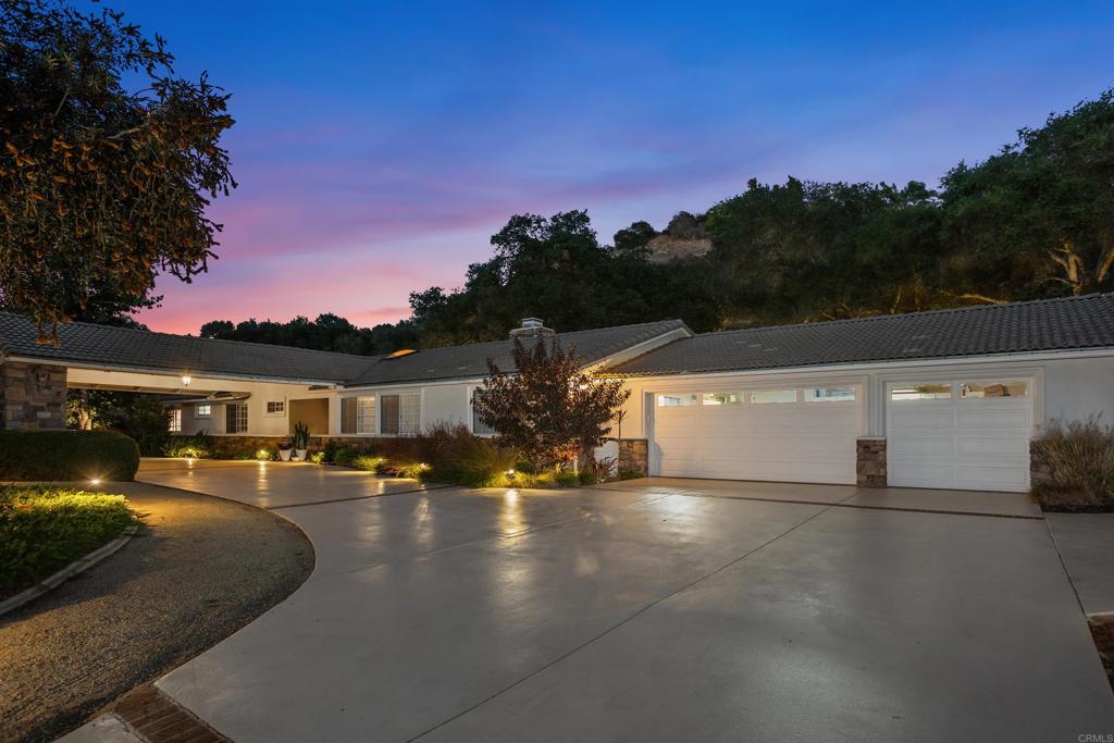 2614 Secret Lake Lane Fallbrook, CA 92028 - Photo 3 of 60 a view of a street with cars