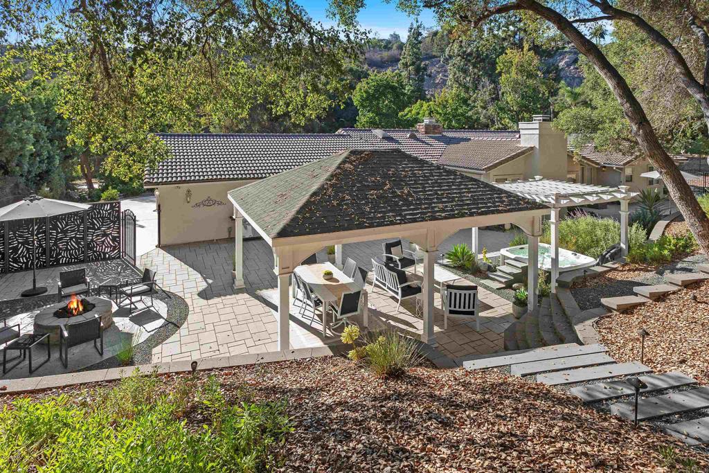 2614 Secret Lake Lane Fallbrook, CA 92028 - Photo 38 of 60 an outdoor space with seating area and trees