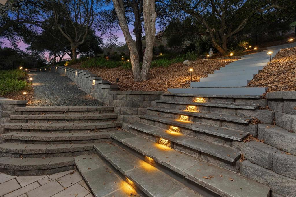 2614 Secret Lake Lane Fallbrook, CA 92028 - Photo 40 of 60 a backyard of a house with lots of green space
