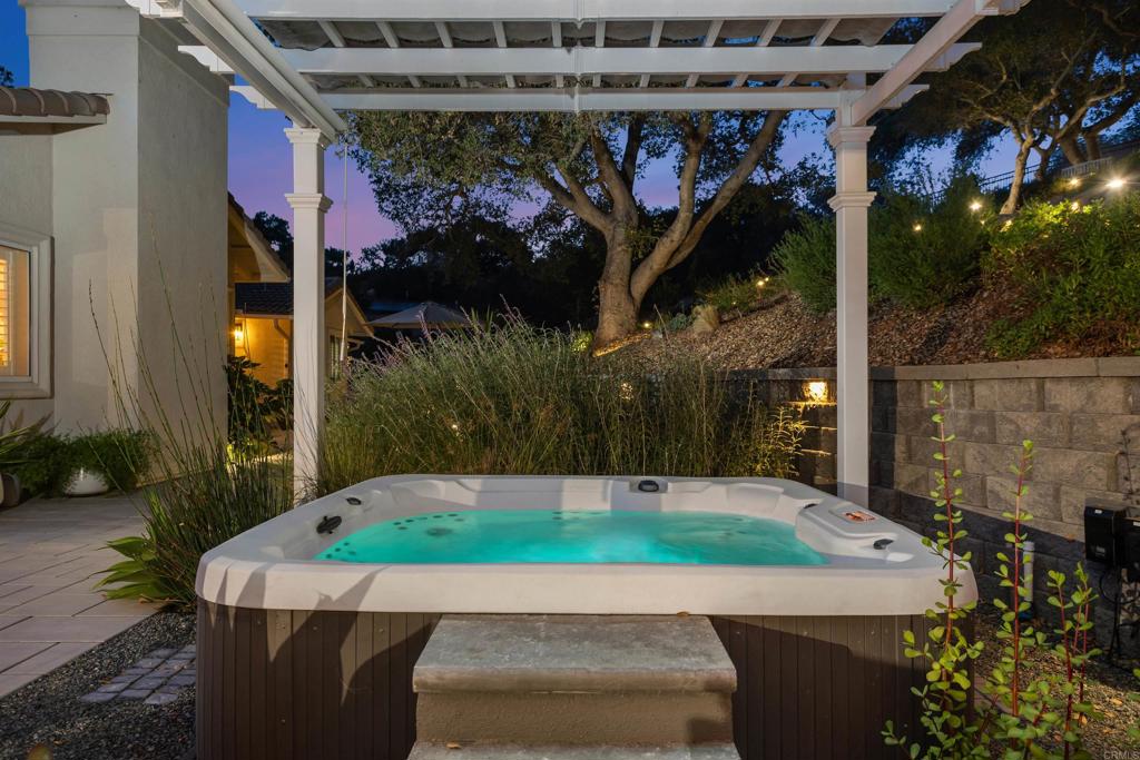 2614 Secret Lake Lane Fallbrook, CA 92028 - Photo 44 of 60 a wooden bench sitting in front of building