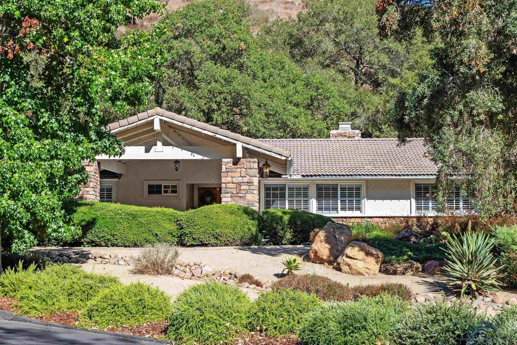 2614 Secret Lake Lane Fallbrook, CA 92028 - Photo 49 of 60 a front view of a house with a yard