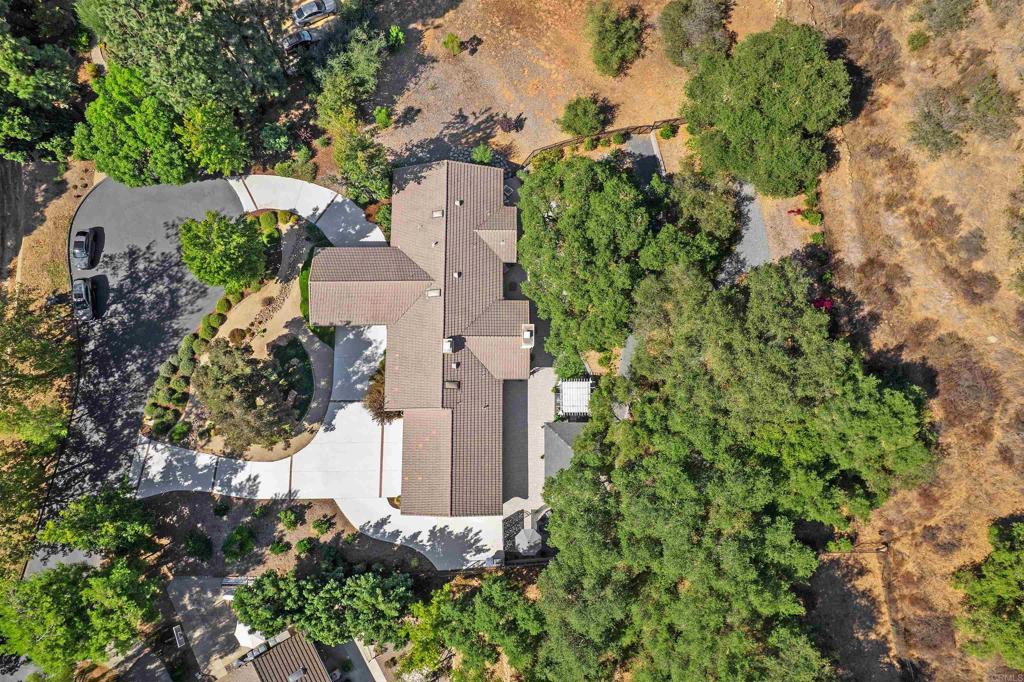 2614 Secret Lake Lane Fallbrook, CA 92028 - Photo 54 of 60 an aerial view of a house with a yard
