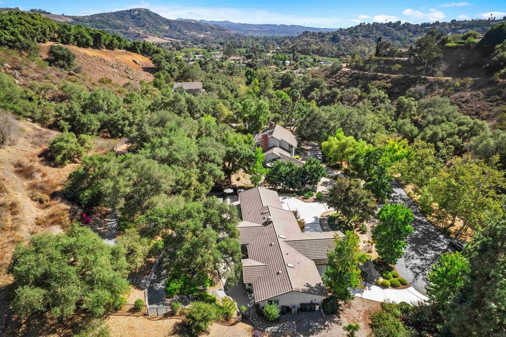 2614 Secret Lake Lane Fallbrook, CA 92028 - Photo 56 of 60 an aerial view of a house with a yard