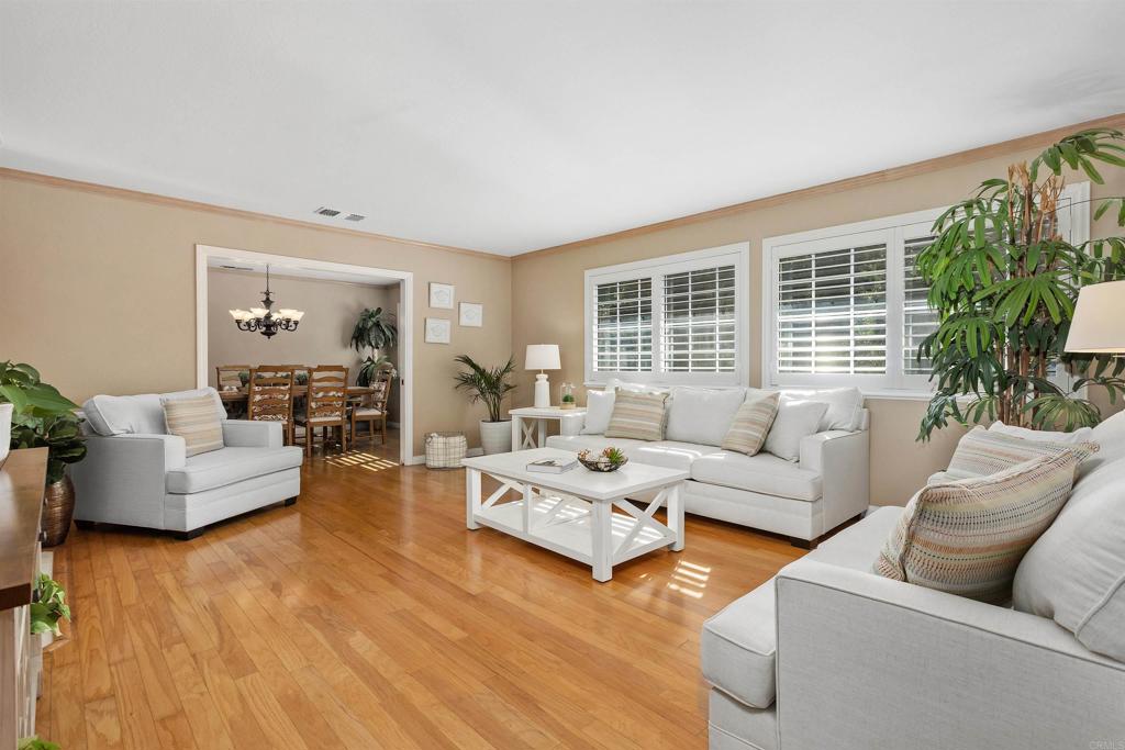 2614 Secret Lake Lane Fallbrook, CA 92028 - Photo 7 of 60 a living room with furniture and a large window