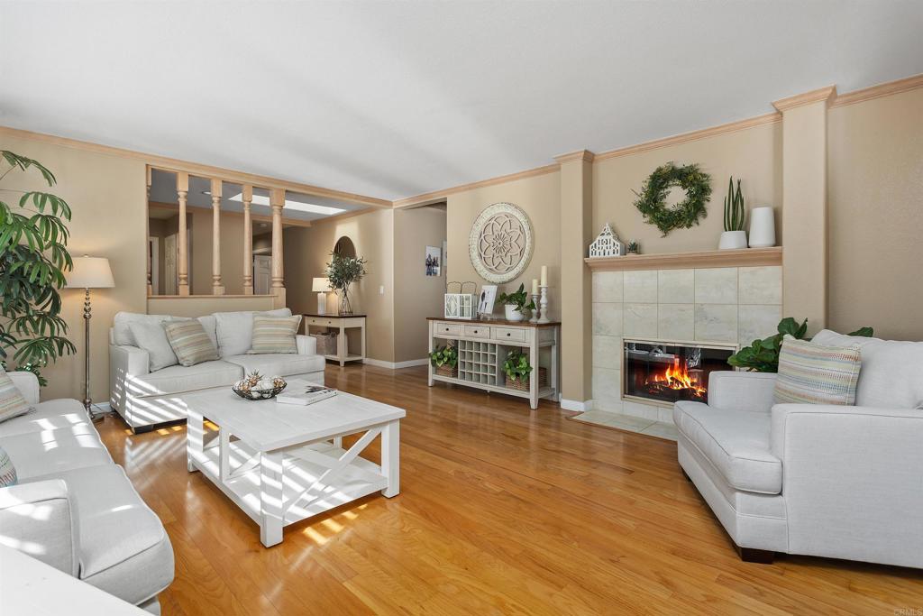 2614 Secret Lake Lane Fallbrook, CA 92028 - Photo 8 of 60 a living room with furniture and a fireplace