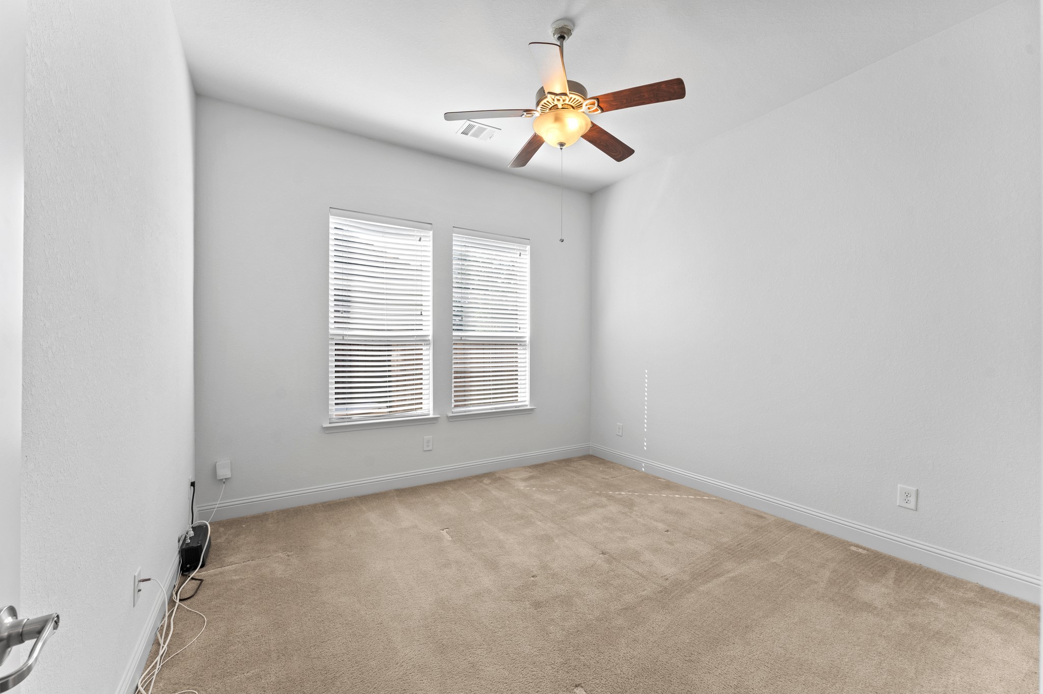 39 Tioga Place Tomball, TX 77375 - Photo 13 of 50 an empty room with a window