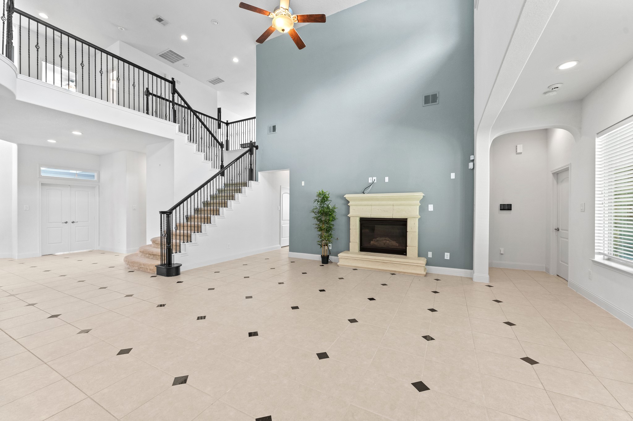 39 Tioga Place Tomball, TX 77375 - Photo 23 of 50 a view of an empty room and a fireplace