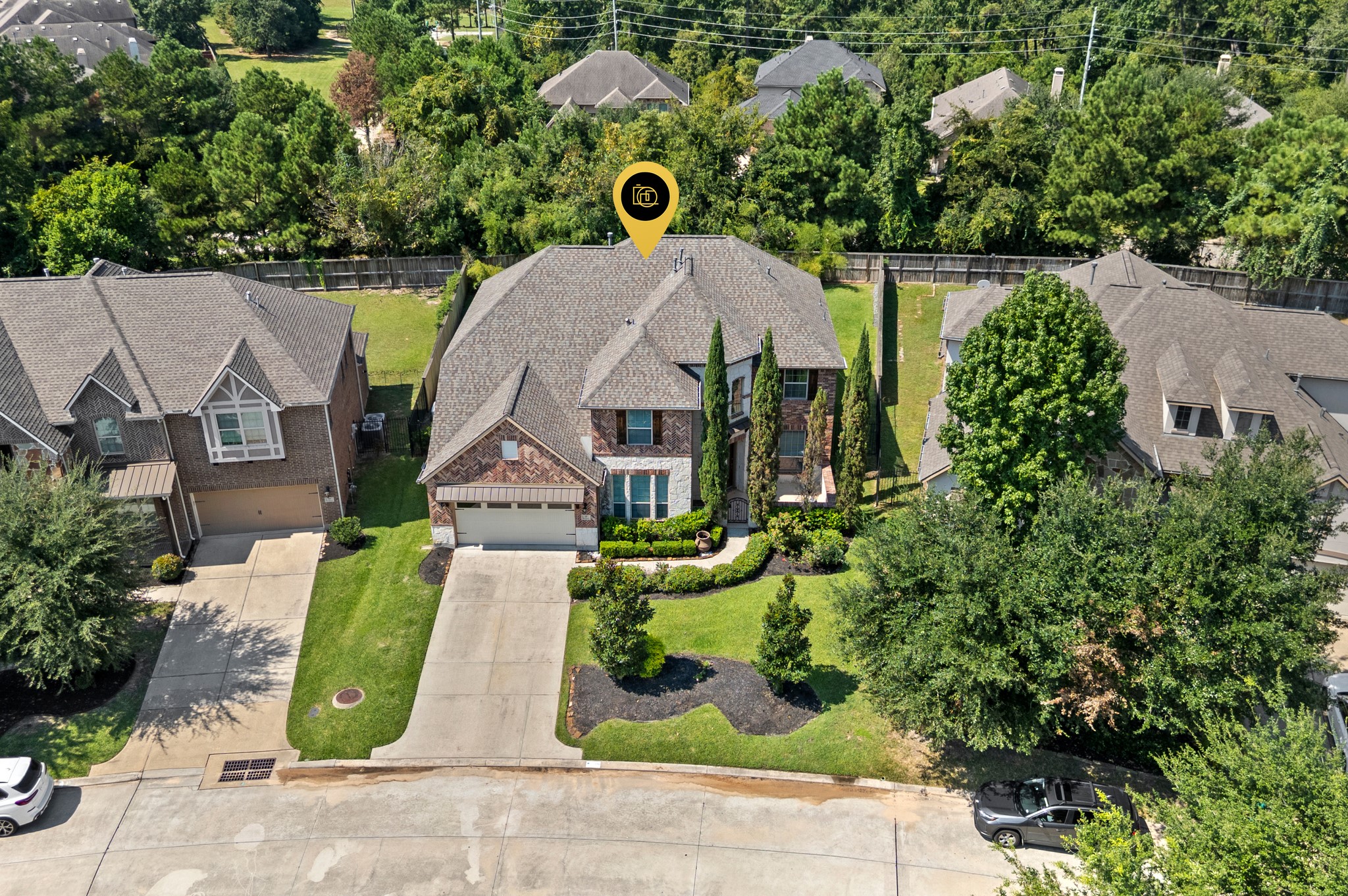 39 Tioga Place Tomball, TX 77375 - Photo 46 of 50 an aerial view of a house