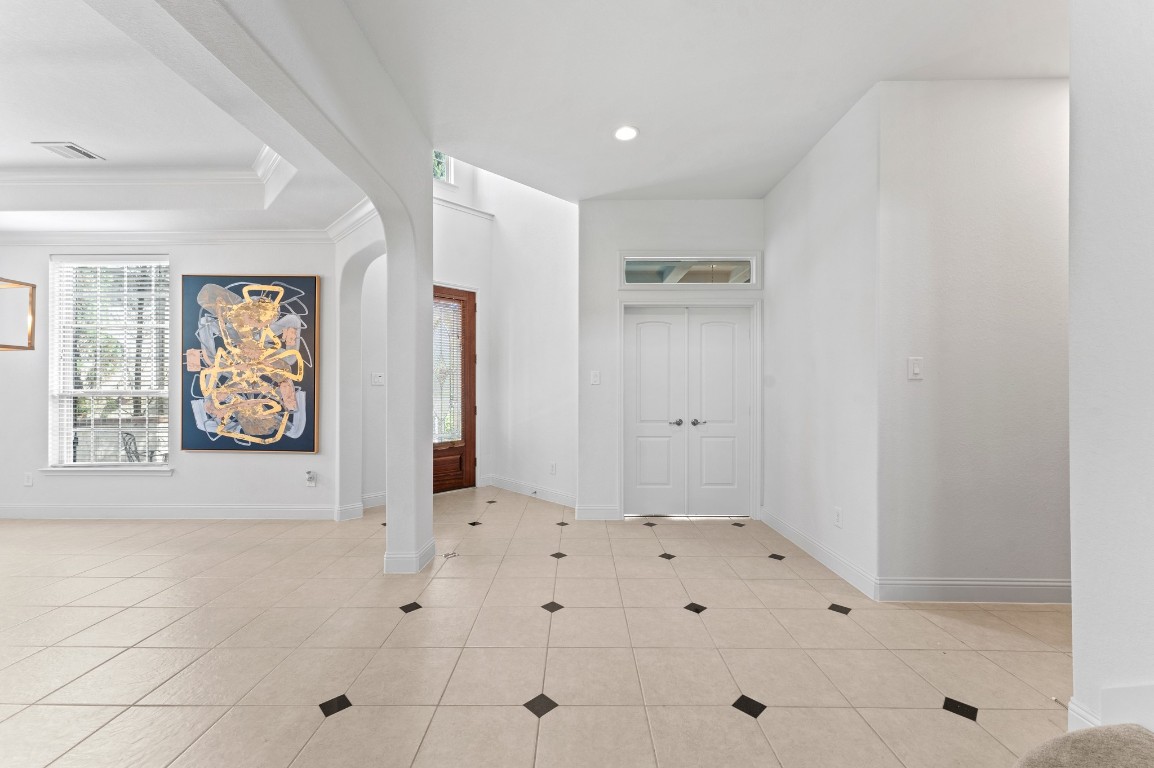 39 Tioga Place Tomball, TX 77375 - Photo 8 of 50 Dining room, main entrance, study and hall to garage