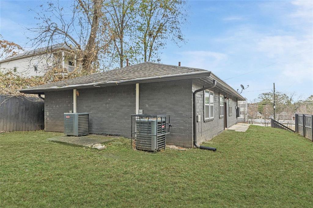 919 Hobson Street Southwest Atlanta, GA 30310 - Photo 20 of 24 a view of a house with a yard
