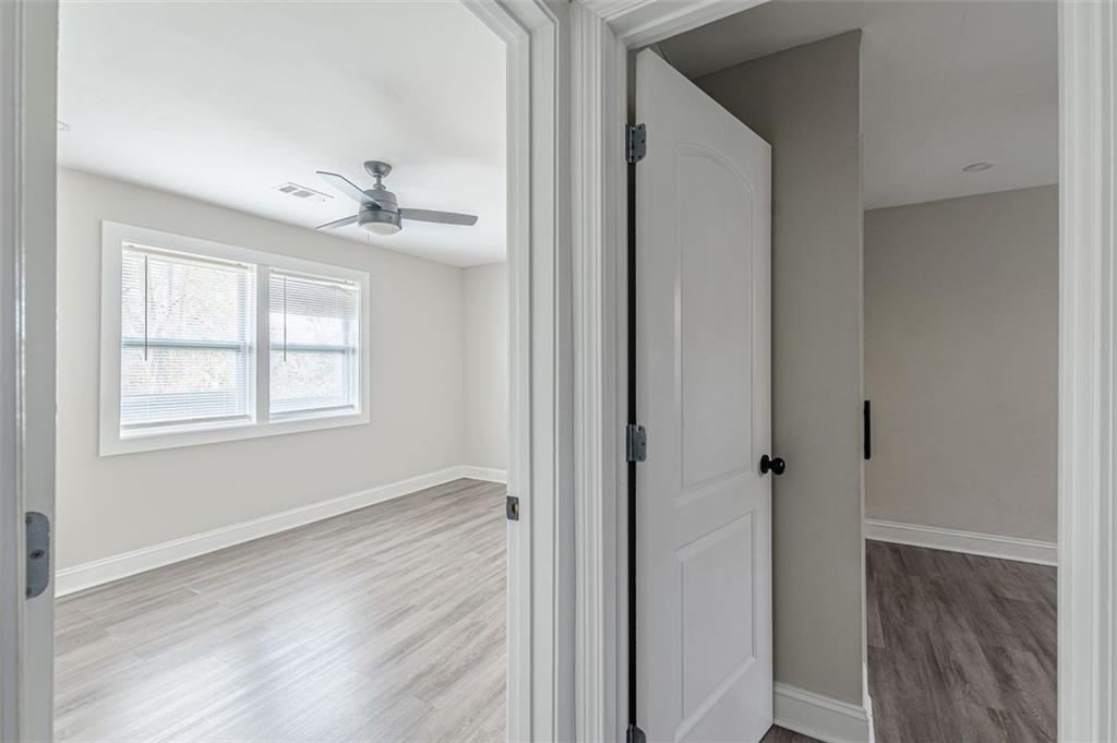 919 Hobson Street Southwest Atlanta, GA 30310 - Photo 8 of 24 a view of an empty room with a window