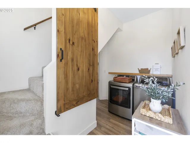 a bedroom with a bed and a table