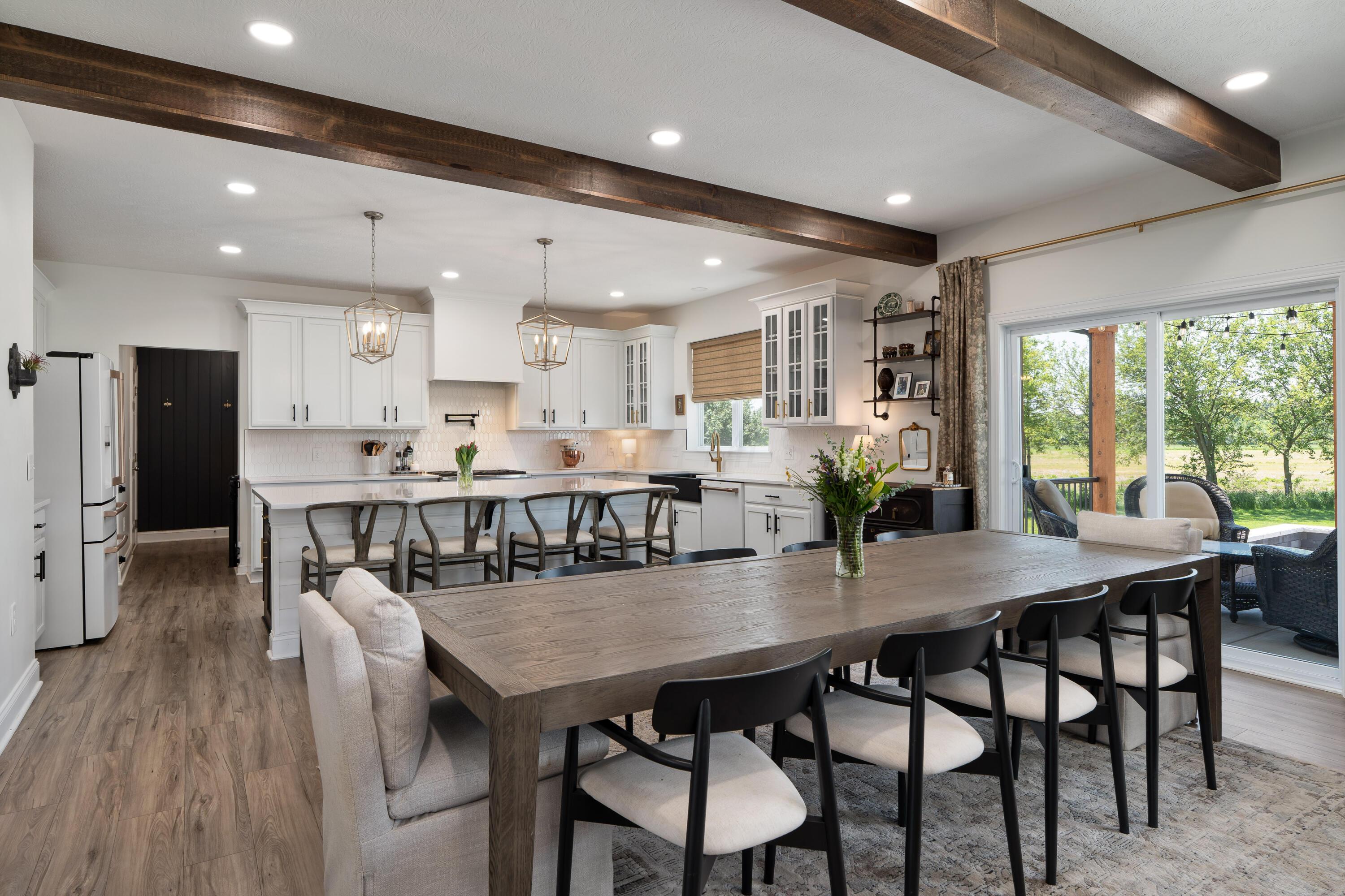7308 Concord Road Delaware, OH 43015 - Photo 19 of 73 Dining Space with Warm wood beam accents - 9'2 x 17'5" ( + - )
