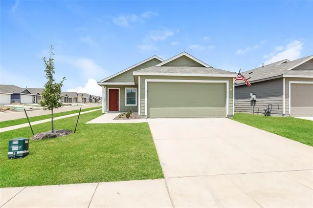 a house view with a garden space