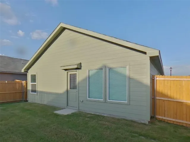 a view of backyard of house