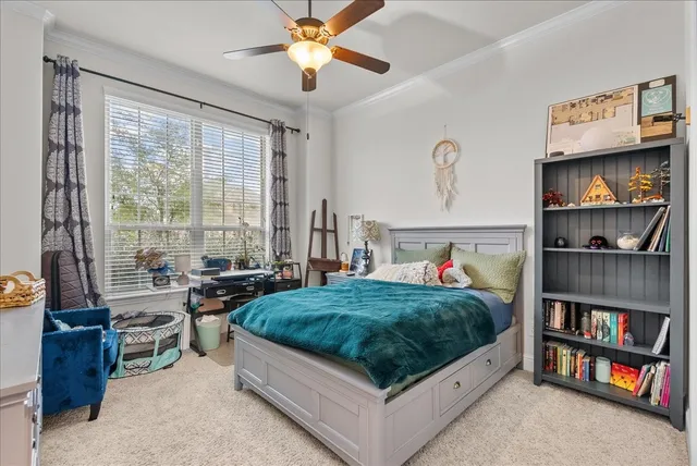a bathroom with a granite countertop sink a toilet and a mirror