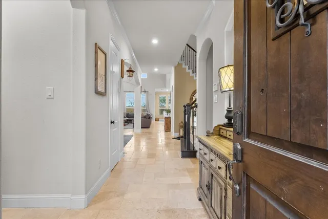 a bathroom with a sink a mirror and a shower