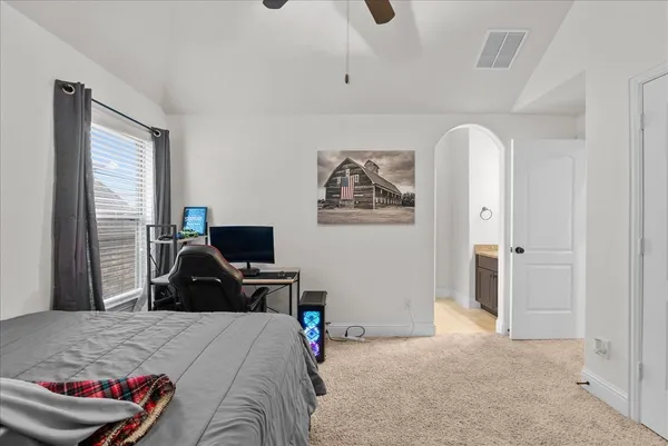 a room with furniture and a chandelier