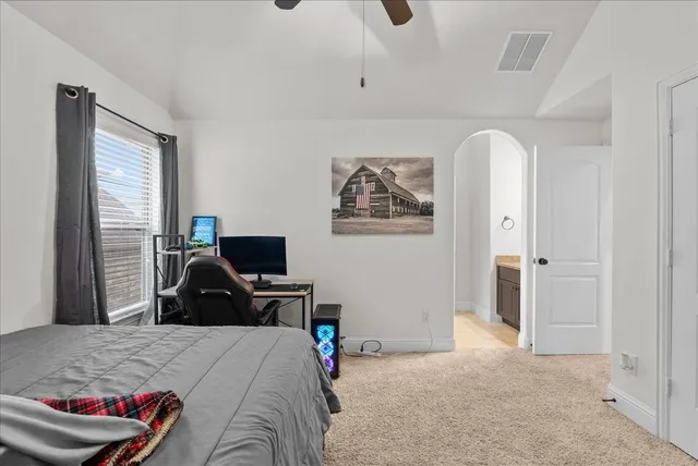 a room with furniture and a chandelier