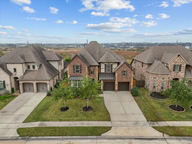 an aerial view of residential building with outdoor space