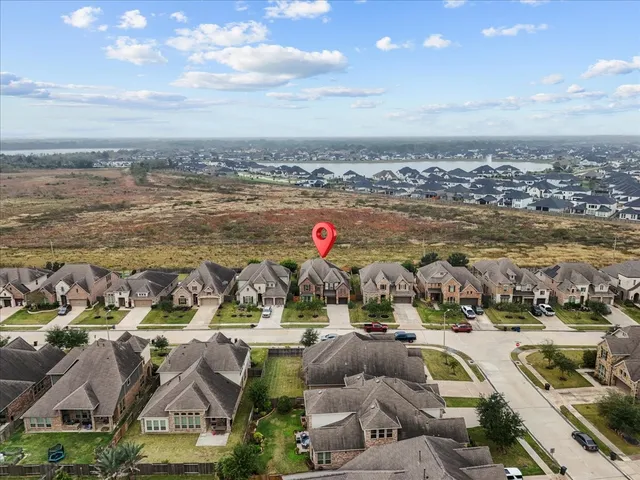 a view of a road with an ocean view