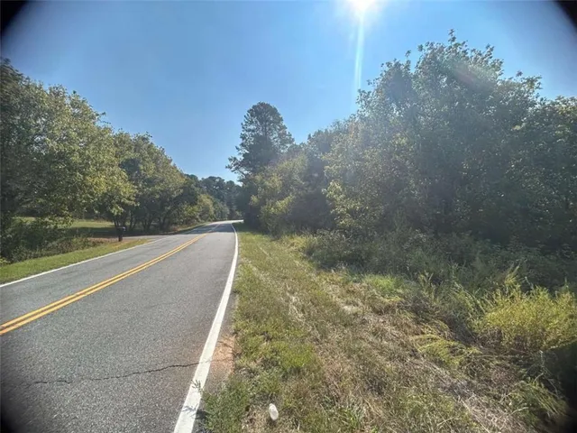 a view of a lake with lots of trees