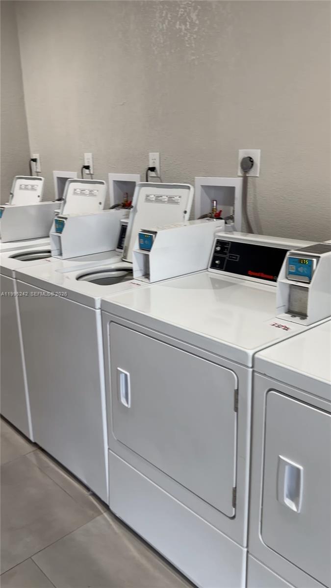 1225 West 35th Street, Unit 2A Hialeah, FL 33012 - Photo 3 of 3 a utility room with dryer and washer