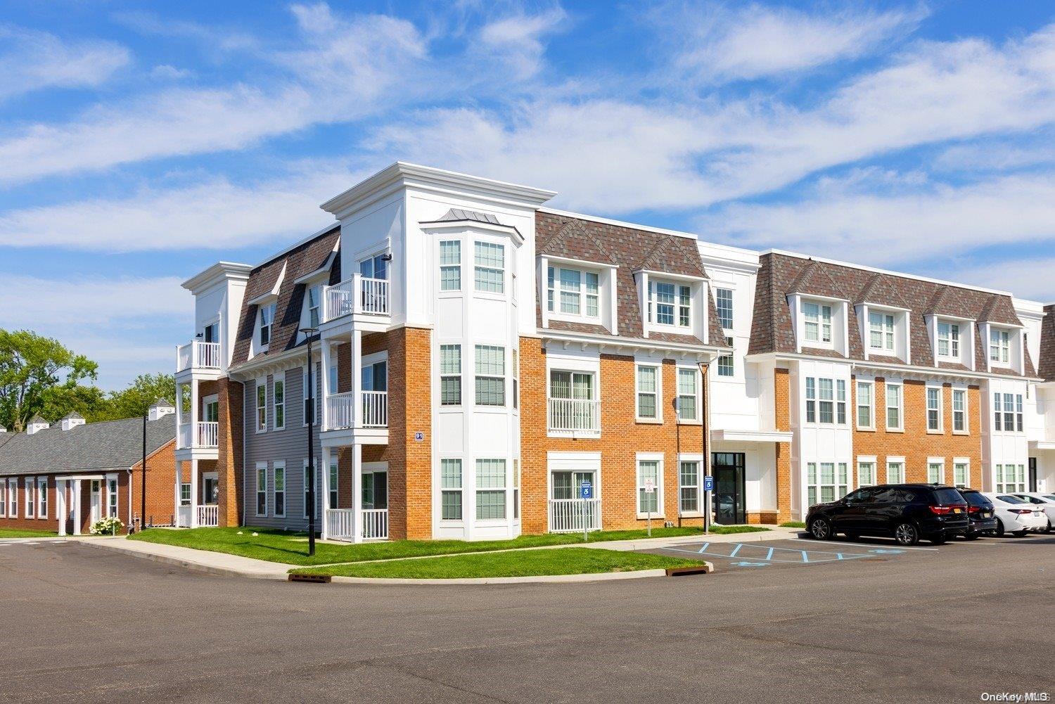 a front view of a building with street view