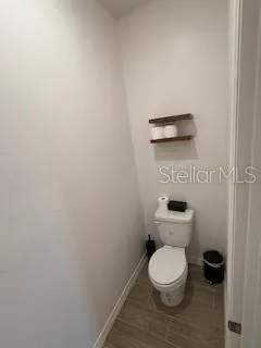a bathroom with a toilet