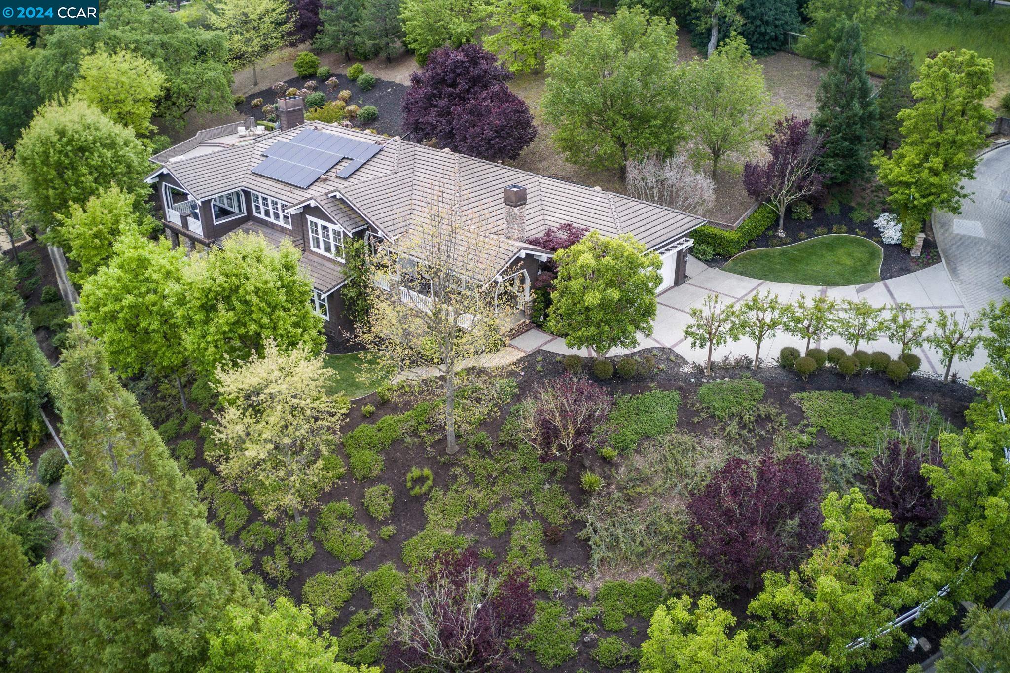 an aerial view of residential house with outdoor space