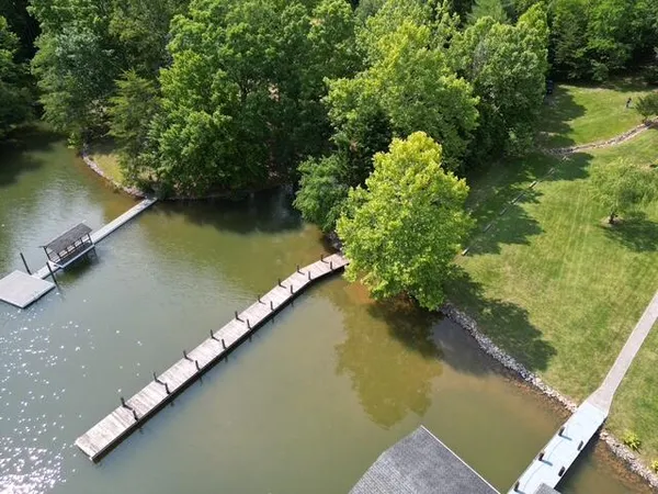 a view of a lake with a yard