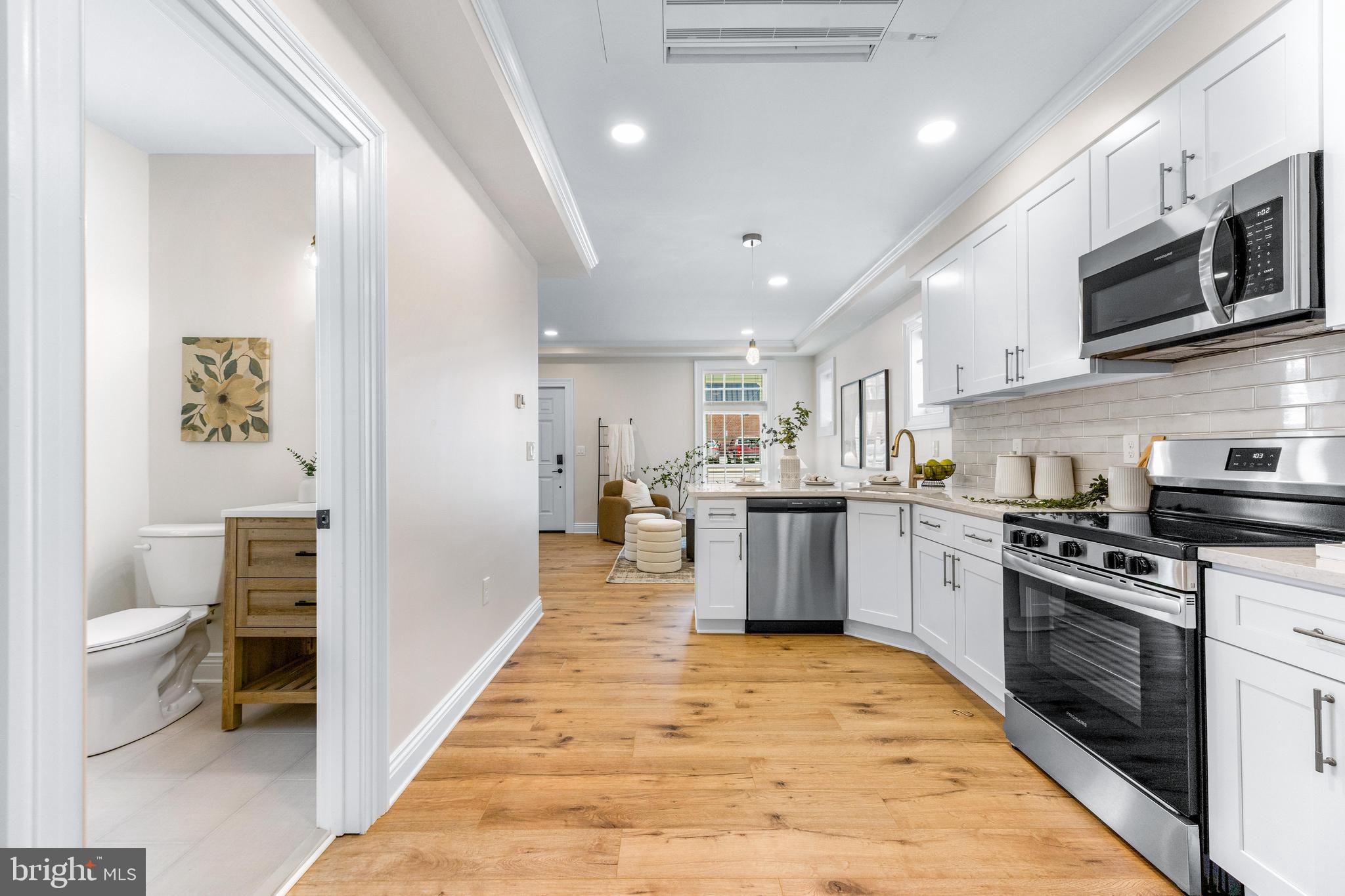 30 East Broadway, Unit AT 1 Bel Air, MD 21014 - Photo 12 of 34 a kitchen with stainless steel appliances granite countertop lots of counter top space and cabinets