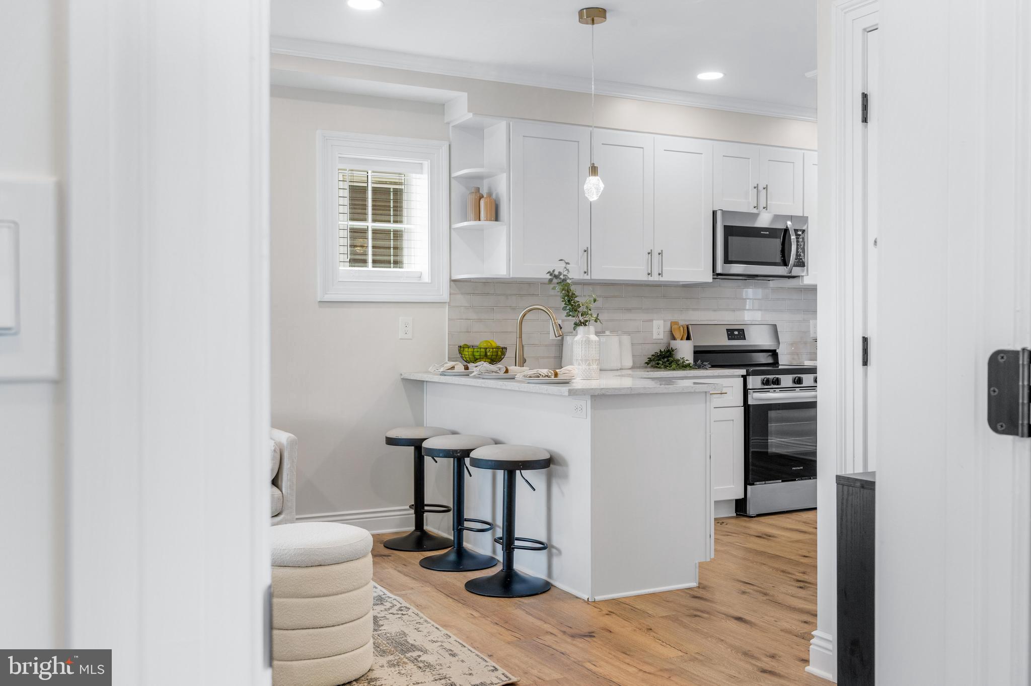 30 East Broadway, Unit AT 1 Bel Air, MD 21014 - Photo 15 of 34 a kitchen with a sink appliances and cabinets