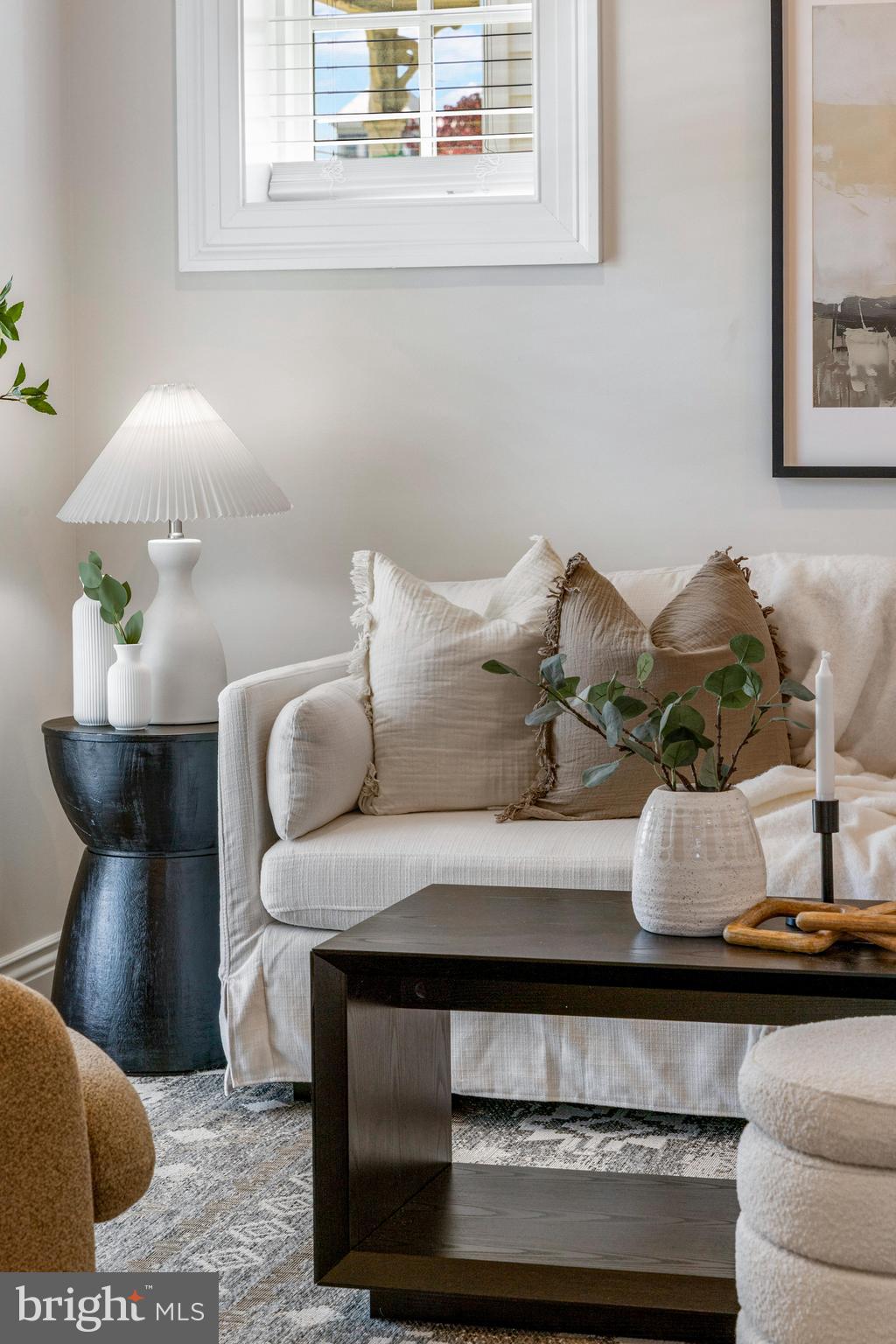 30 East Broadway, Unit AT 1 Bel Air, MD 21014 - Photo 16 of 34 a living room with furniture and wall painting