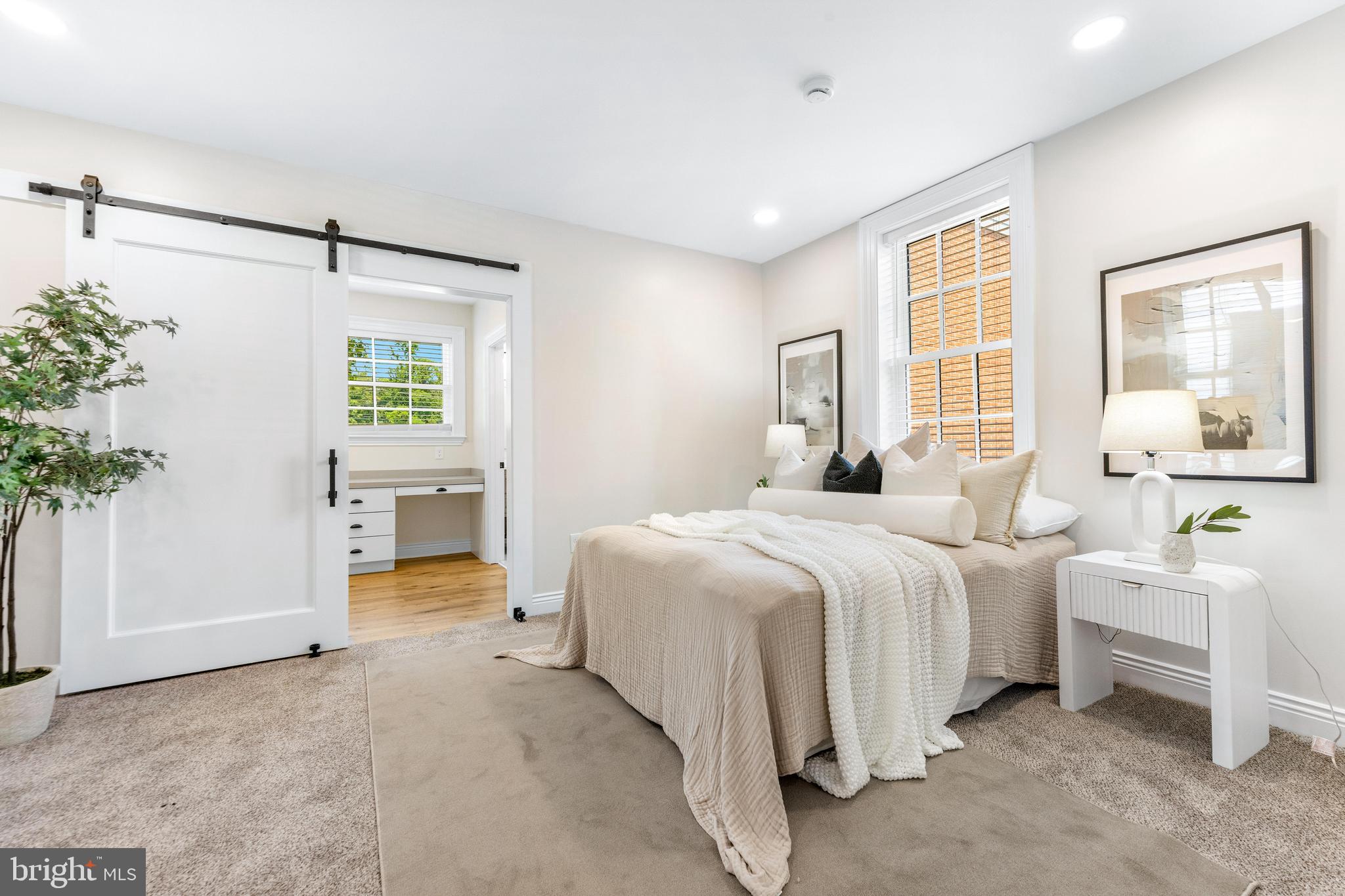 30 East Broadway, Unit AT 1 Bel Air, MD 21014 - Photo 19 of 34 a bedroom with bed and window