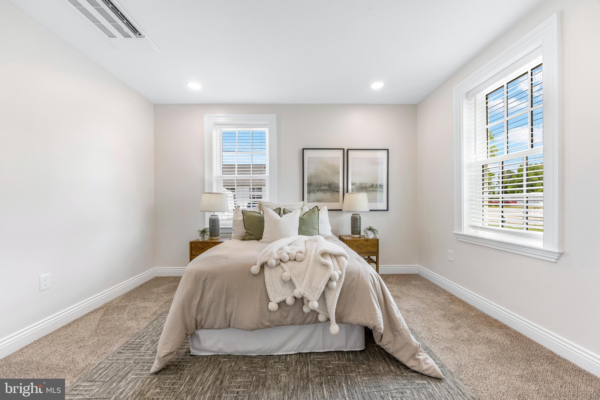 30 East Broadway, Unit AT 1 Bel Air, MD 21014 - Photo 24 of 34 a bed room with a bed and a window