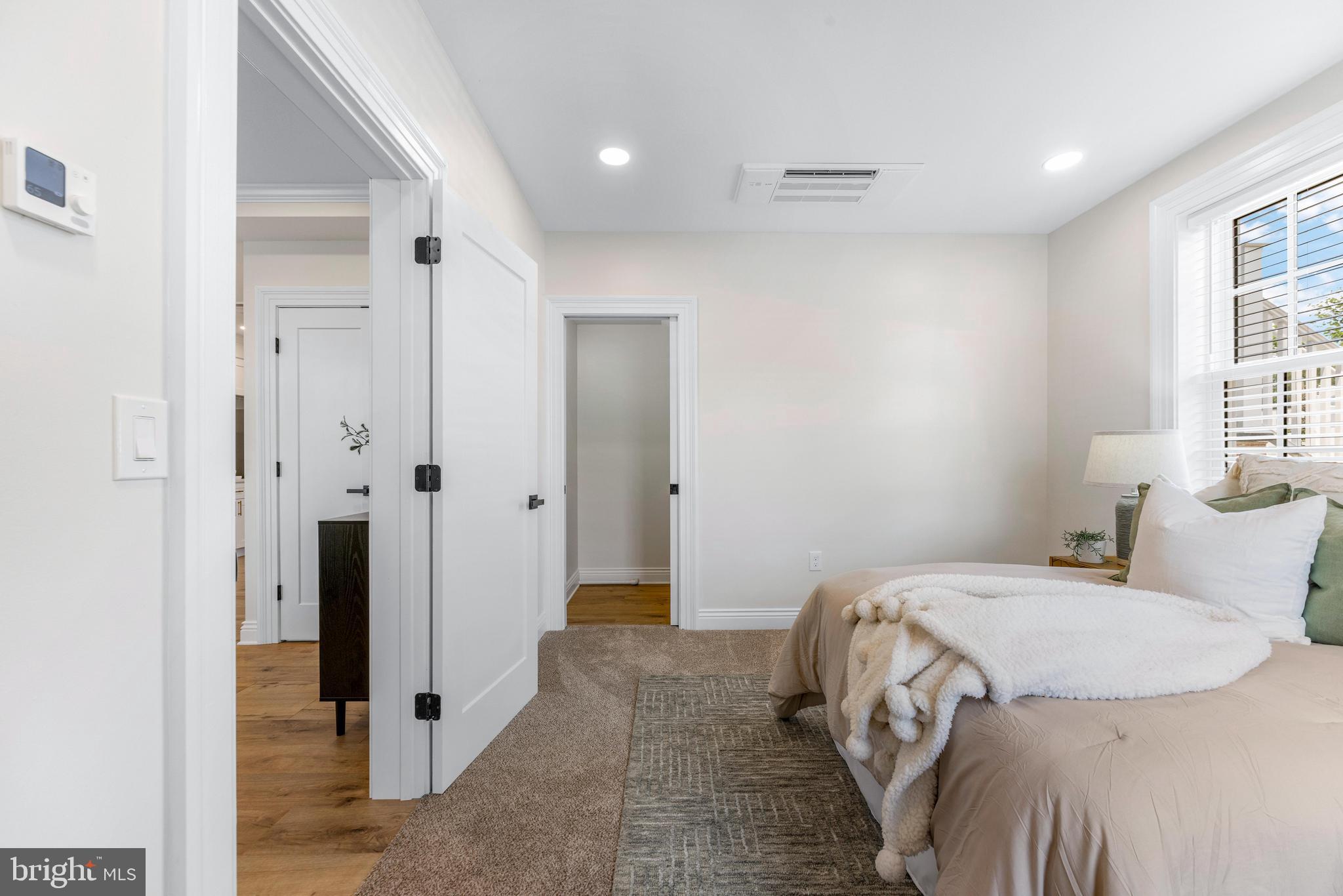 30 East Broadway, Unit AT 1 Bel Air, MD 21014 - Photo 27 of 34 a bedroom with a bed and a window