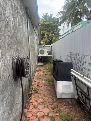 a terrace view with sitting space and garden space
