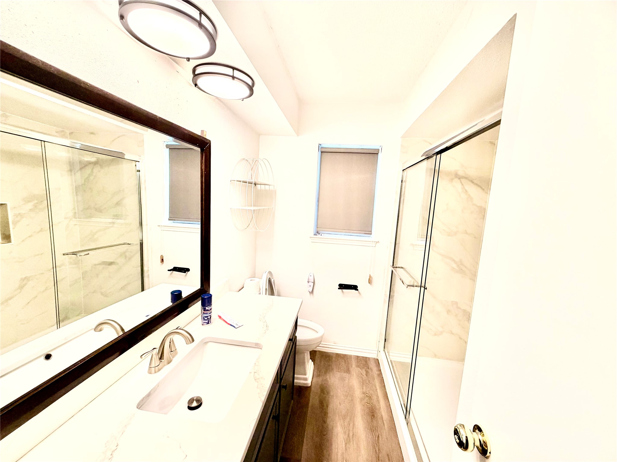 11635 Ridge Run Drive Houston, TX 77064 - Photo 17 of 20 a bathroom with a tub and a sink