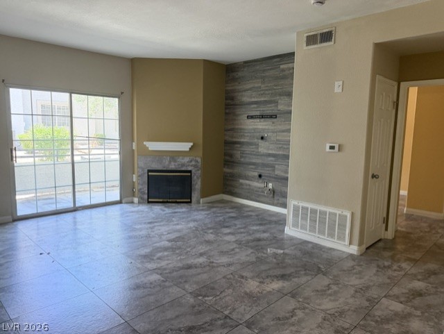 3318 North Decatur Boulevard, Unit 1163 Las Vegas, NV 89130 - Photo 6 of 35 A sleek fireplace anchors this versatile living space with direct outdoor access.